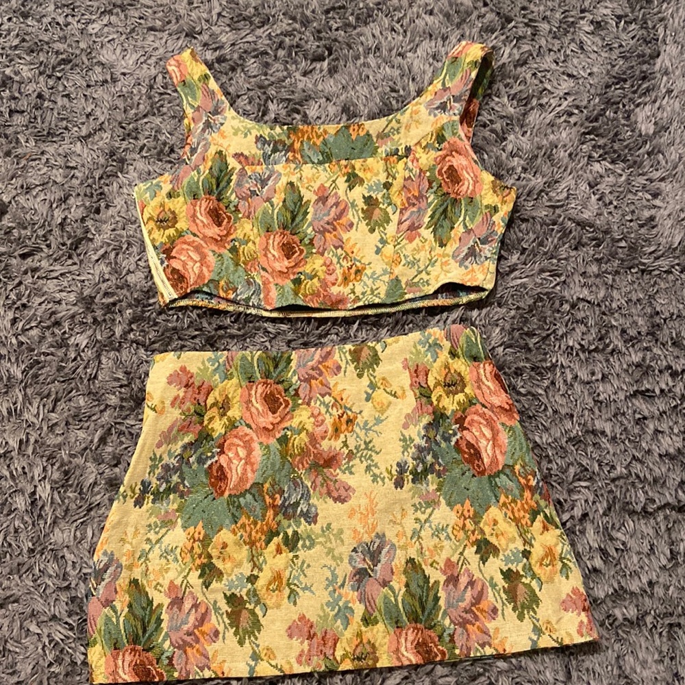 Crop top and mini skirt set, brand new with tags, fits more like an XL